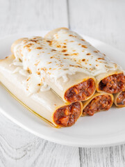 Oven-Baked Cannelloni Stuffed with Savory Bolognese and Covered in Golden Mozzarella
