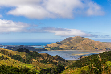 Scenic coastal view of Otago Harbor from Otago Peninsula, Dunedin, New Zealand