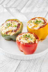 Juicy Baked Bell Peppers Stuffed with Flavorful Bolognese and Topped with Golden Mozzarella