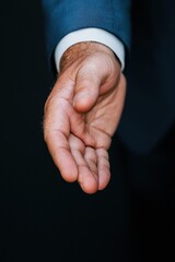 Fototapeta premium Executive Minimalism Professional Hand Gesture in Deep Blue Corporate Aesthetic - Refined Leadership Communication and Modern Workplace Nonverbal Dynamics