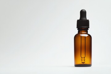 Fototapeta premium Minimalist Wellness Elixir Amber Glass Essential Oil Dropper in Clean Aesthetic - Holistic Healing and Sustainable Self-Care Product