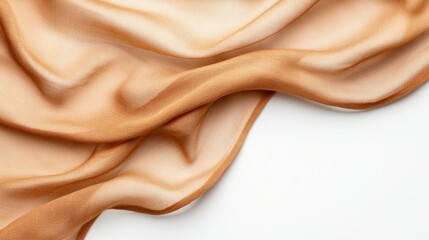 Obraz premium A soft, flowing piece of fabric in warm beige tones, showcasing elegant folds and a smooth texture against a light background.