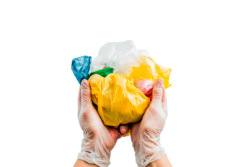 Hands in gloves hold a trash can filled with colorful plastic isolated on transparent background