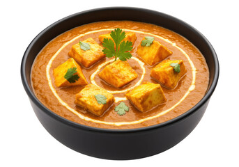 A black ceramic bowl of paneer butter masala filled with cubes of soft paneer isolated on transparent background