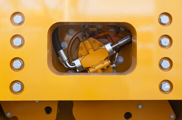 Hydraulic mechanisms of heavy loading equipment, close-up.