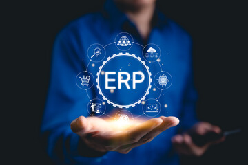 ERP - Enterprise Resource Planning Concept. Business professional presenting ERP system icons representing enterprise resource planning, data integration, and automation tools. ERP system software,