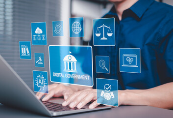 Digital Government and Online Public Services Technology. Man using laptop with icons digital...