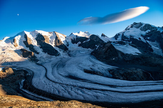 Panorama of Piz Pal&uuml;, Bellavista, Cresta G&uuml;zza in the evening light. The Pers Glacier and Morteratsch Glacier can be seen in the foreground. Piz Pal&uuml; is a 3899 metre high mountain in the Bernina group