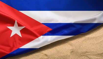 Cuban flag on sandy beach: red, white, blue stripes and star representation
