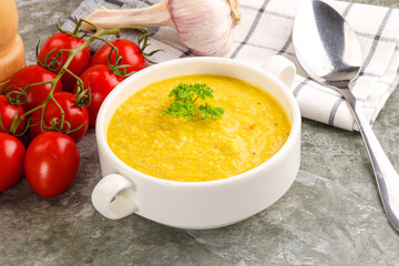 Vegetarian corn cream soup served parsley