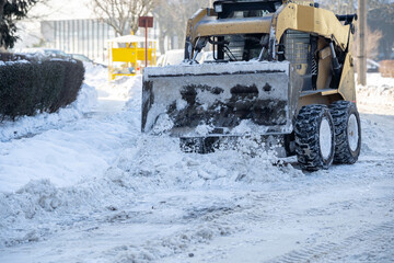 Snow Removal Equipment Actively Cleared Snow and Ice During the Cold Winter Season
