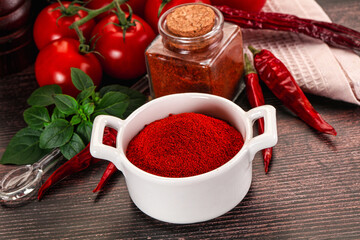 Spicy dry paprika powder in the bowl