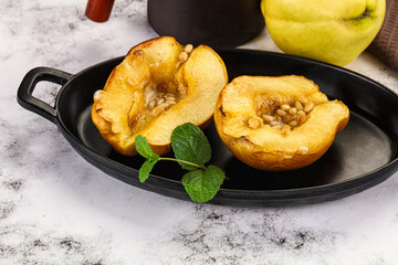 Baked quince with honey and cedar