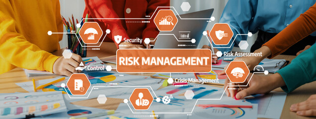 A professional team collaborates on risk management strategies, utilizing visual aids and laptops to enhance decision-making and drive successful outcomes in a business environment. Amity
