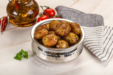 Baked mini potato with herbs