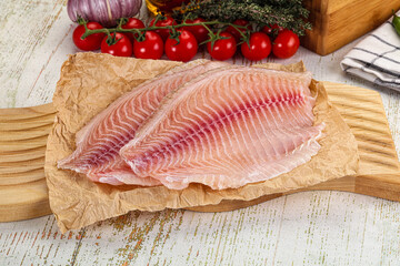 Raw Tilapia fish fillet slice