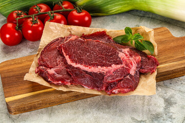Raw beef cheeks cut for cooking