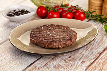 Grilled juicy beef cutlet for burger