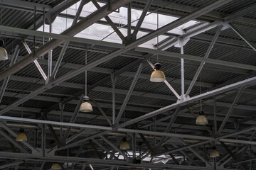 Indoor architecture: Open framework ceiling with pendant lamp for industrial space or large-scale...