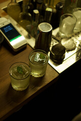 two glasses with cocktails