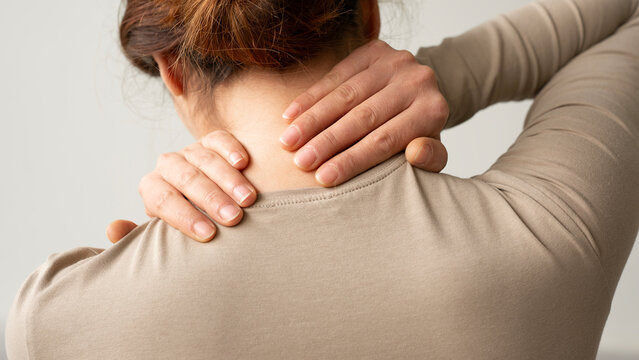 Woman suffering from nape pain