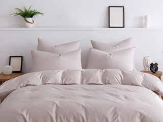 Double bed with a fluffy duvet in a beige duvet cover front close-up view photo