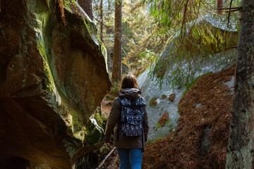 young woman hiking in the mountains