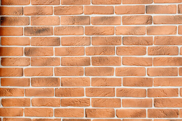 smooth beautiful red brick wall, artificial decorative bricks, building wall background, texture