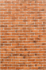 Fototapeta premium smooth beautiful red brick wall, artificial decorative bricks, building wall background, texture