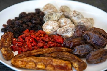 Group of dehydrated dried fruits, dates, goji berries, raisins, dried bananas and Turkish figs. Superfood