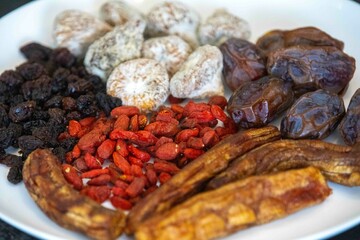 Group of dehydrated dried fruits, dates, goji berries, raisins, dried bananas and Turkish figs. Superfood