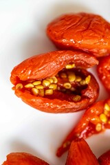 The goji berry, also known as wolfberry pinyin, is the sweet fruit of Lycium barbarum or Lycium chinense, two closely related species of thornbush in the nightshade family, Solanaceae