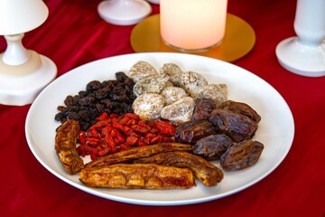 Group of dehydrated dried fruits, dates, goji berries, raisins, dried bananas and Turkish figs. Superfood