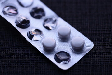 A blister pack sitting on a table, suitable for use in product display or advertising.