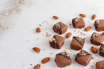 Handmade chocolate with pistachios, dark and milk chocolate pieces.