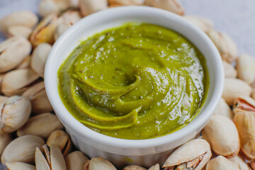 Delicious homemade pistachio paste or cream,spread with pistachios.