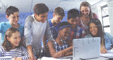 In school, diverse students collaborating on laptop, solving math problems together