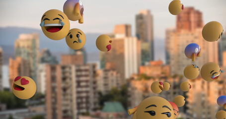 Floating emojis expressing various emotions over city skyline at sunset
