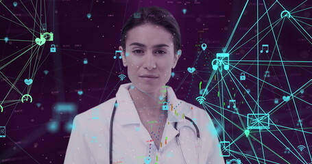 Doctor in lab coat surrounded by digital interface graphics, exploring technology