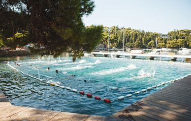 Swimmer in the pool during a swim. Competition, training in water