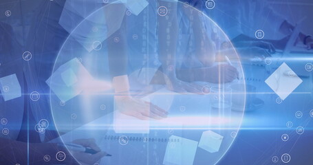 Light trails and scope scanning over mid section of group of office colleagues working at office