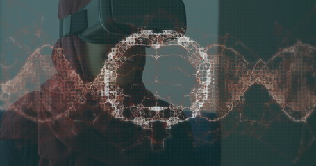 Image of brain scan and medical data processing on interface, over smiling man in vr headset