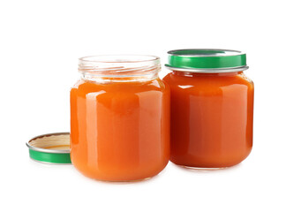 Baby food. Tasty puree in glass jars isolated on white