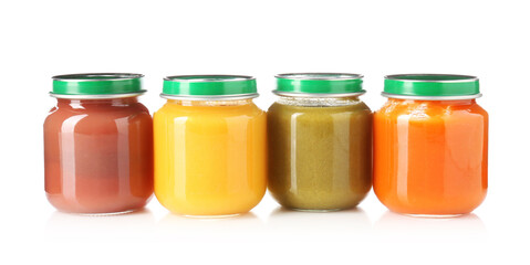 Baby food. Tasty puree in glass jars isolated on white