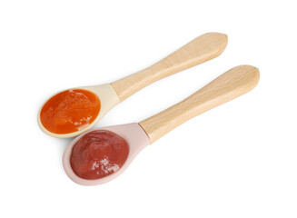 Baby food. Spoons with tasty puree on white background, above view