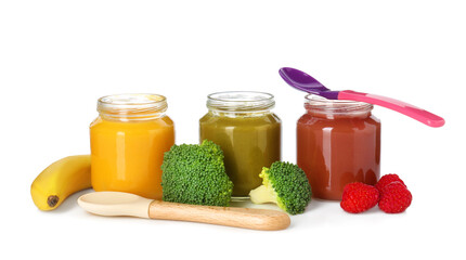 Baby food. Tasty puree in jars, spoons and ingredients on white background