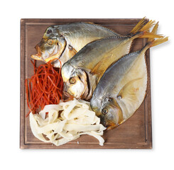 Many different dried fish snacks isolated on white, top view
