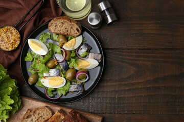 Delicious salad with herring, egg, mustard and vegetables on wooden table, flat lay. Space for text