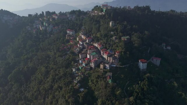 Aerial, drone shot 4k. Aerial view of the clear day in Pelling, Sikkim. Northern India. Indian Mountain. D Log. Bird eye View. Travelling Northeast Video. Indian mountain village. IN front of Skywalk.