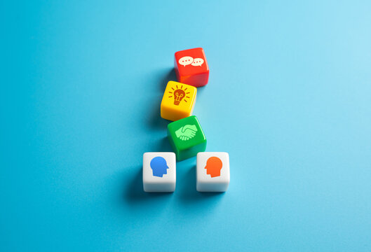 Business partnership and discussion of plans. Negotiating deals, or planning future growth. Brainstorming strategies. Teamwork, collaboration, and aligning business goals for mutual success.